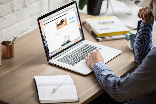 a person working on a presentation in laptop